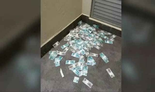 Malha de dinheiro é jogada pela janela de apartamento em BC